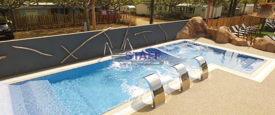 Small pool with straight lines and hydromassage jets at a campsite